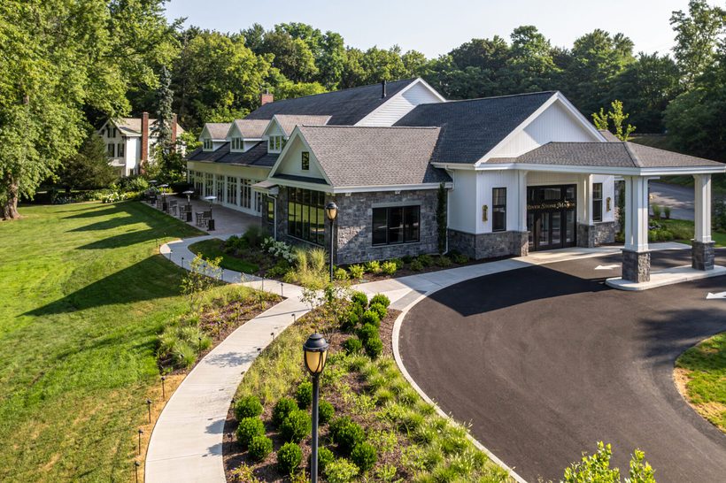 Aerial view of the event center and porte-cochère at River Stone Manor in Schenectady, New York